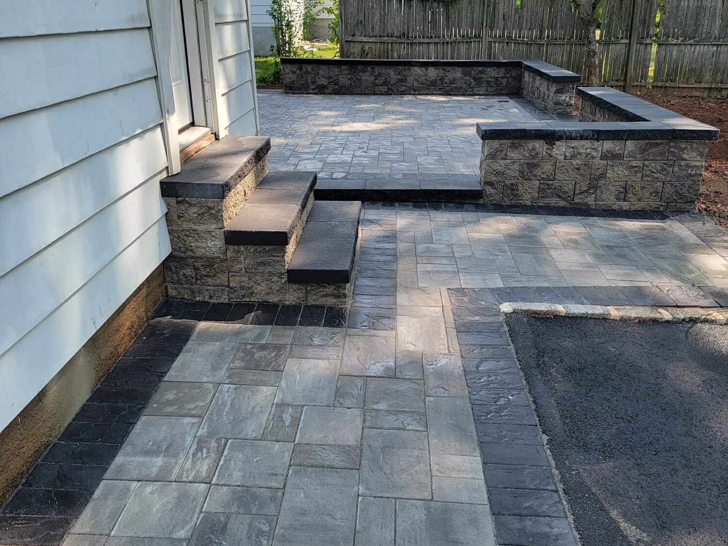 Completed backyard patio installation in New Jersey